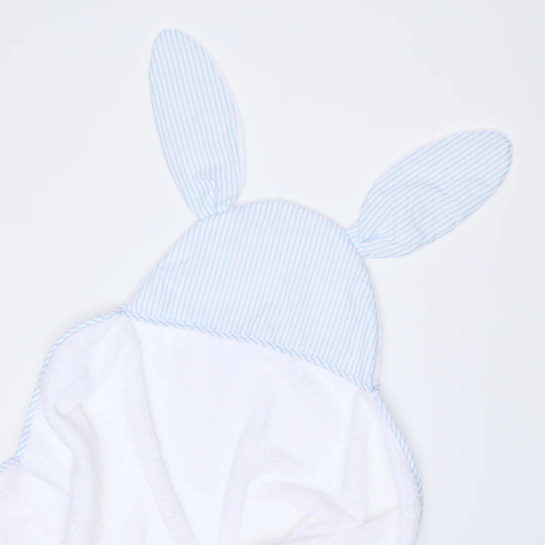 White hooded towel with blue striped bunny ears