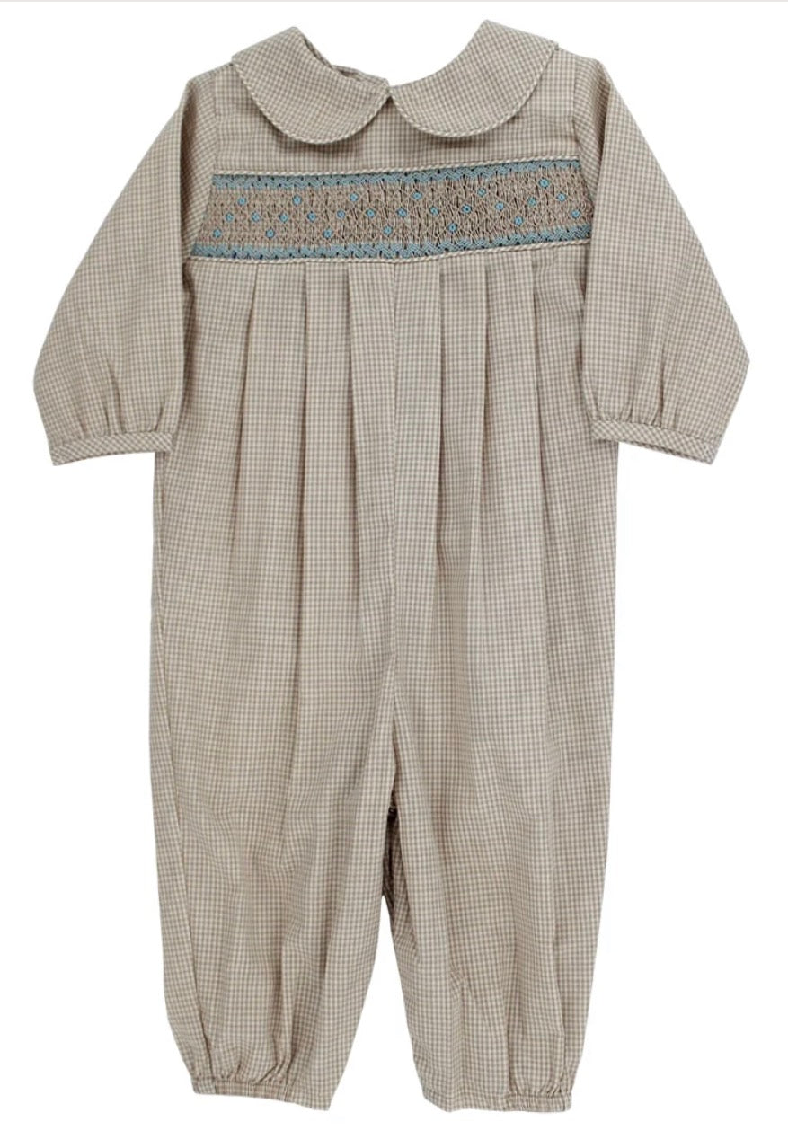 Tan and white checkered smocked romper with blue accent color in the smocking plate