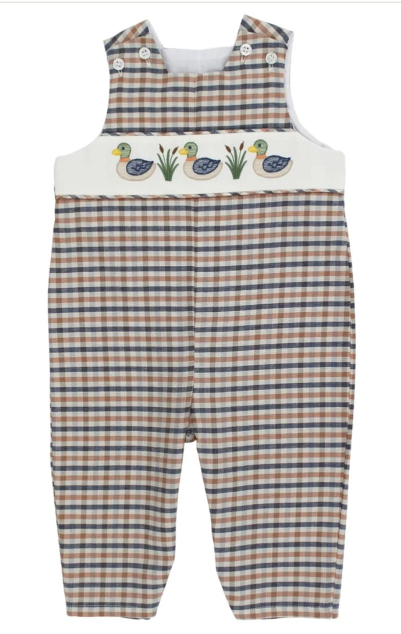 Checkered overalls with duck design on a white background