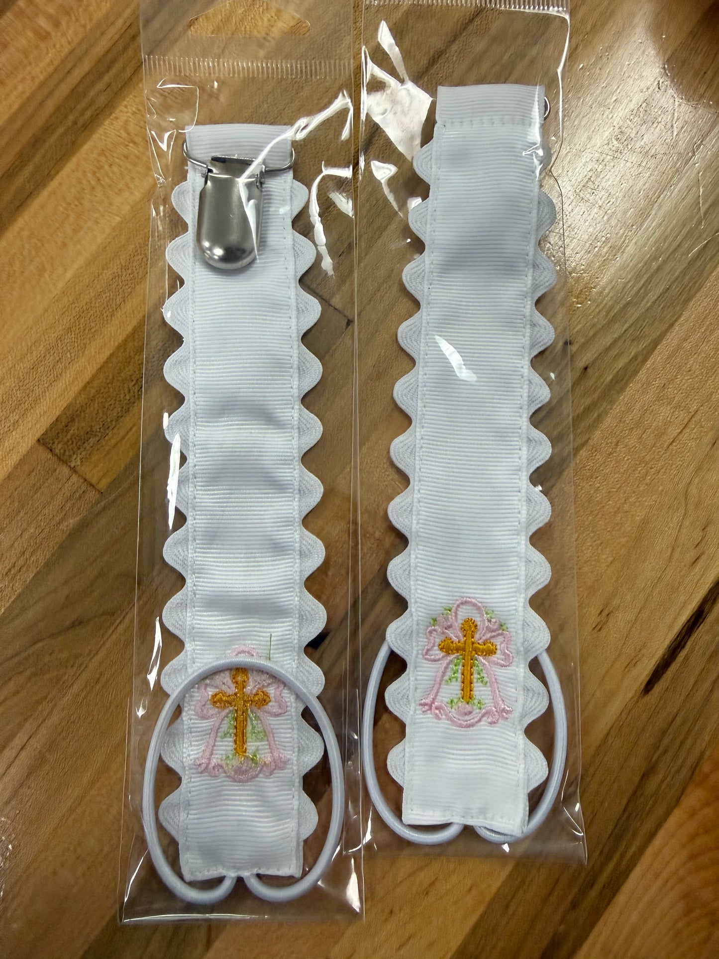 Pink Crosws scalloped pacifier holder with metal clip