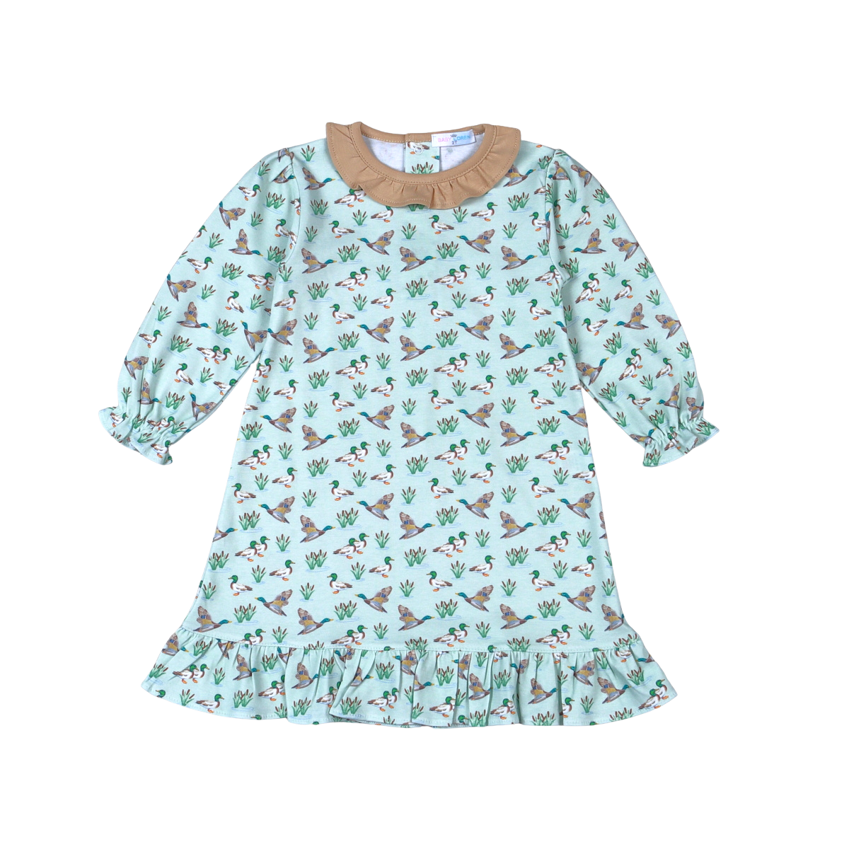 A children's long-sleeve dress with a light mint green background, covered in a pattern of flying ducks and green cacti, featuring a tan ruffled collar and a ruffled hem.