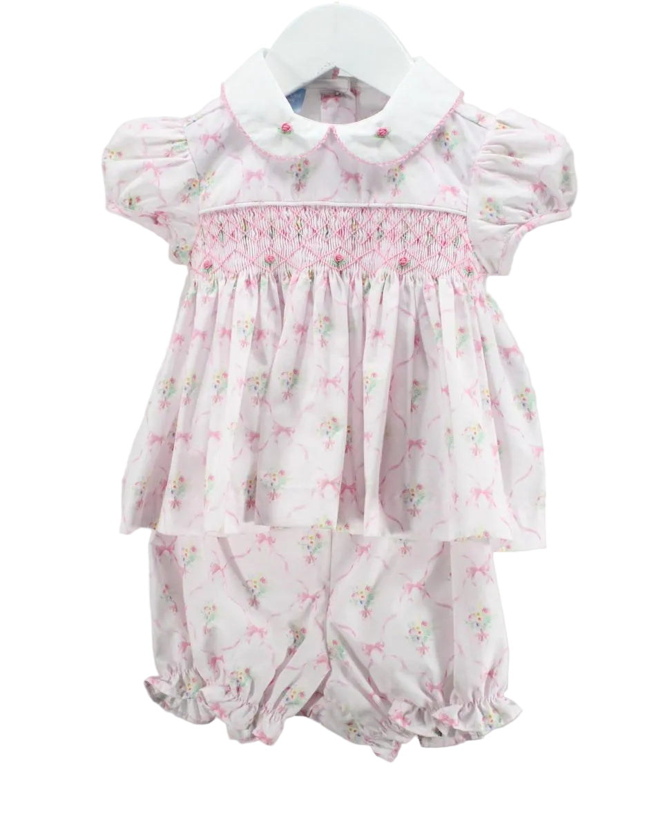Pink floral baby smocked bloomer set with white collar.