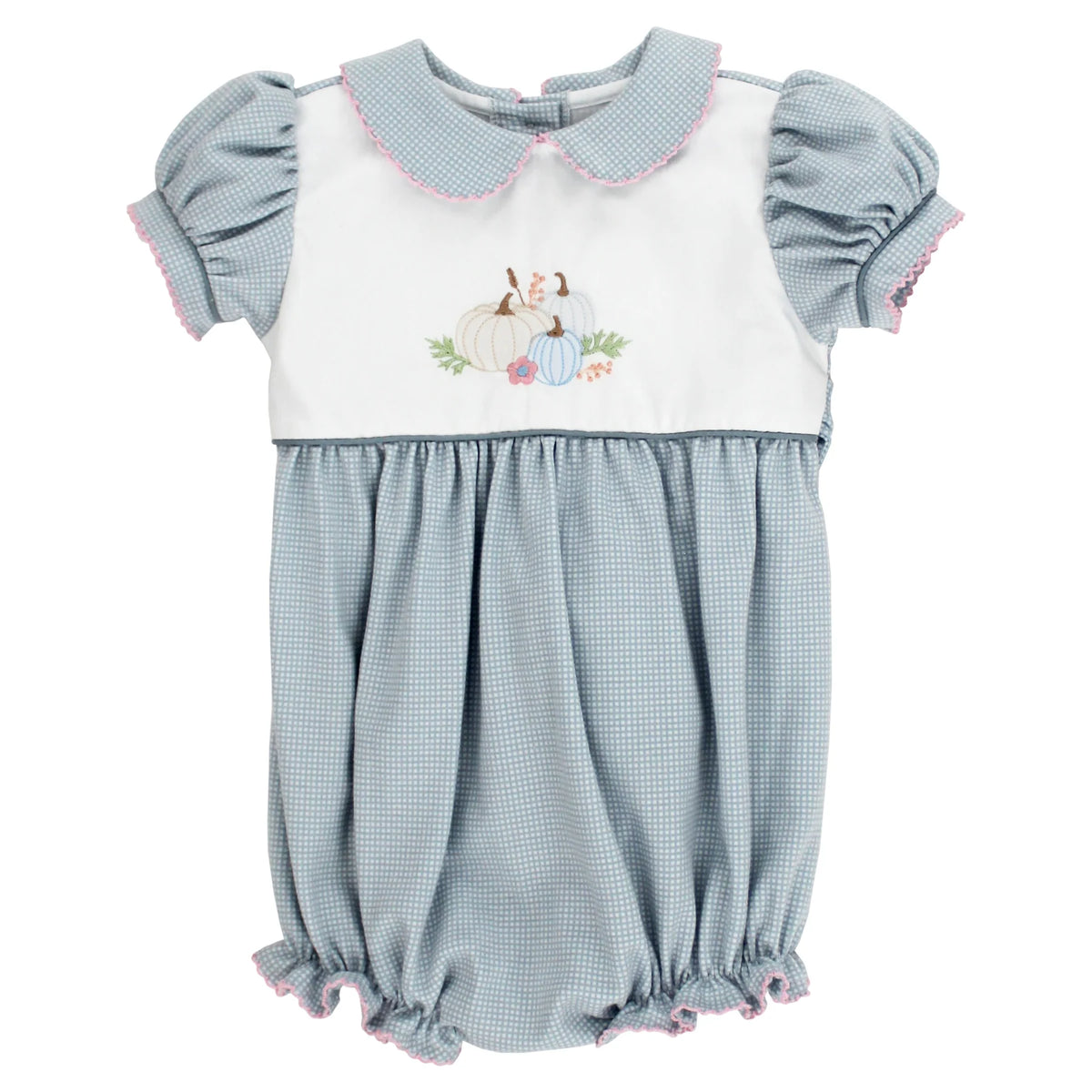 A baby romper in a light blue and white gingham pattern, featuring a white bib-style chest panel with a Peter Pan collar, short puff sleeves with pink trim, and a central embroidered design of a sheep and pumpkins. The bottom is a gathered bloomers leg with pink ruffled trim.