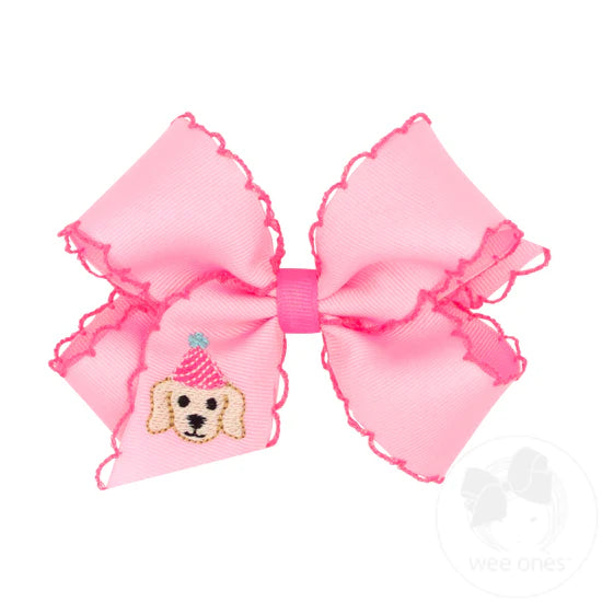Pink hair bow with moonstitch edging and birthday dog embroidery.