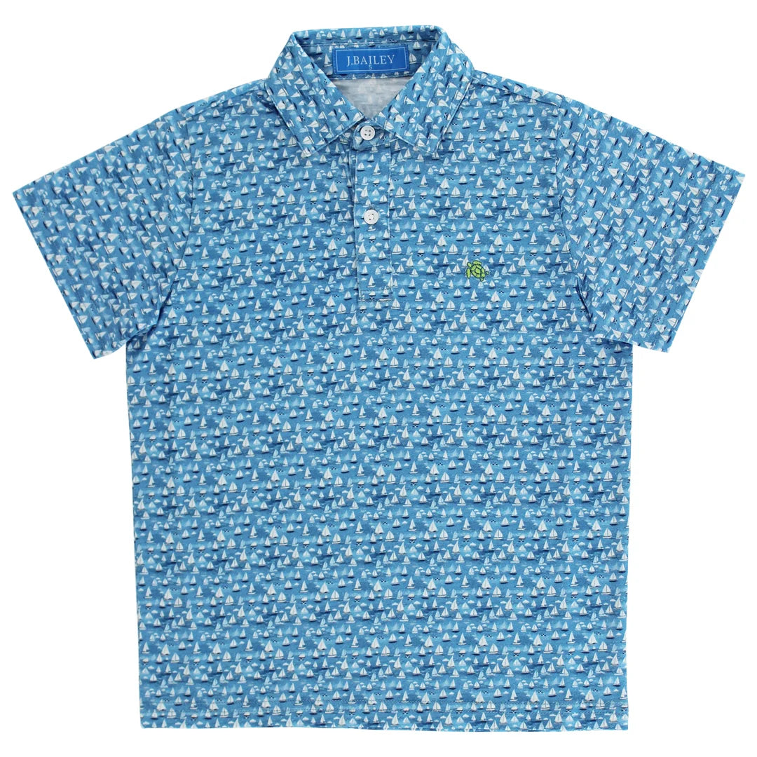 Blue performance polo with sailboat pattern