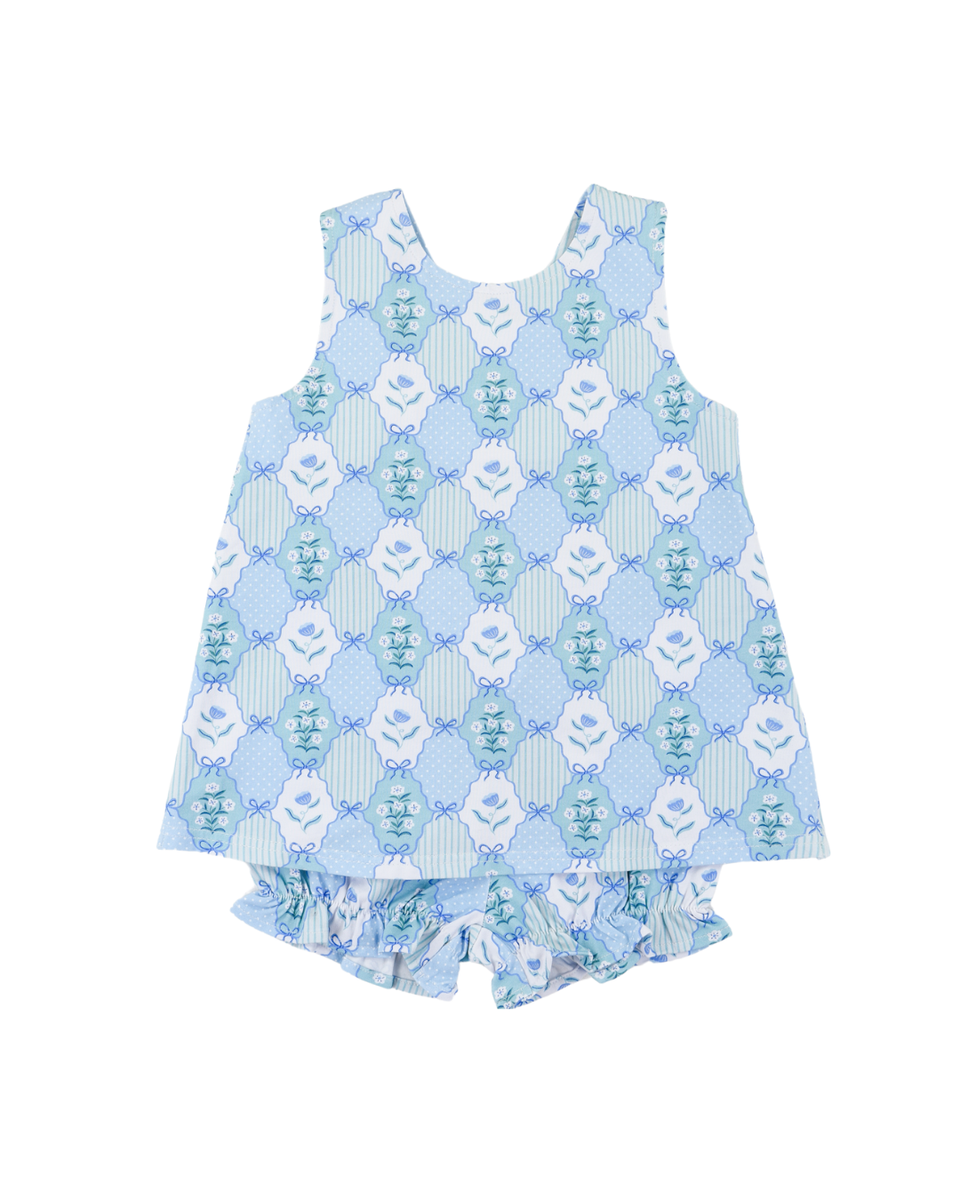 Children's blue and white patterned bloomer set with blue bows and florals.