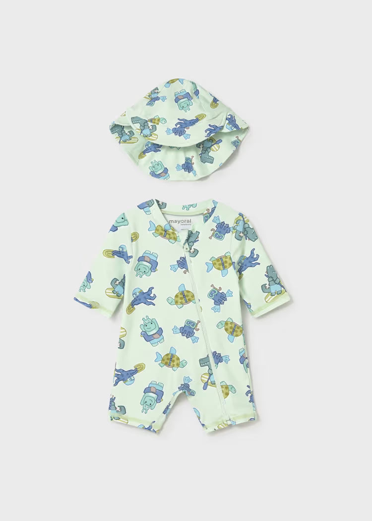 Pale green sun protection one piece swimsuit with overall sea creature caricature design.