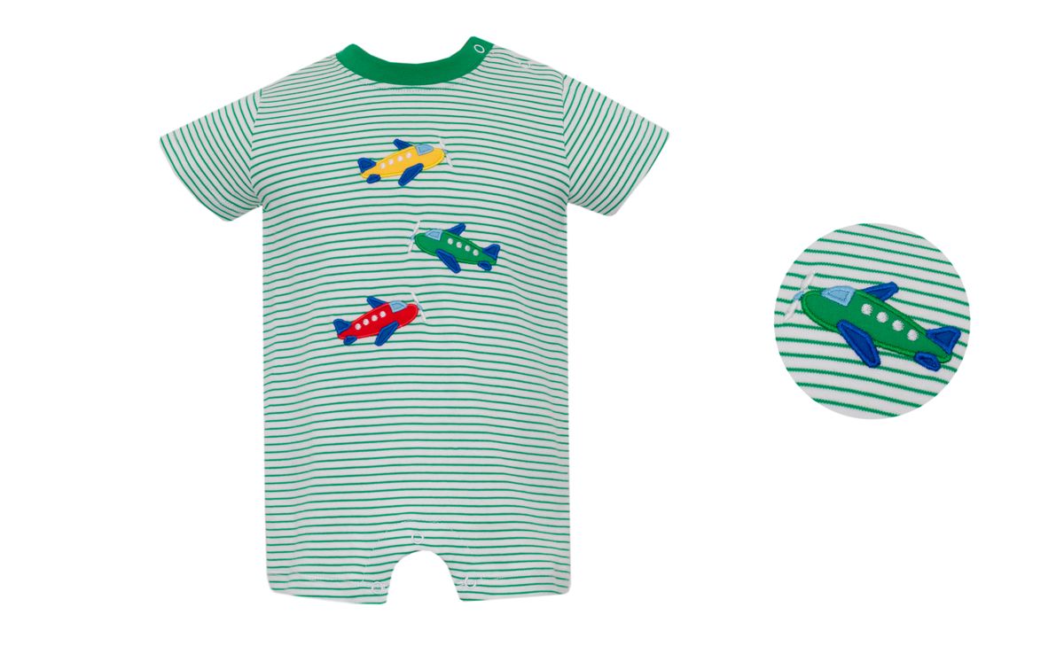 Green and white striped baby romper with airplane designs