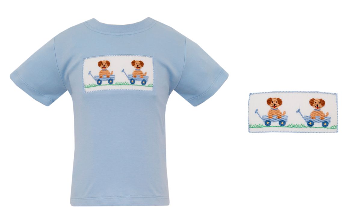 Light blue smocked t-shirt with dog in a wagon design