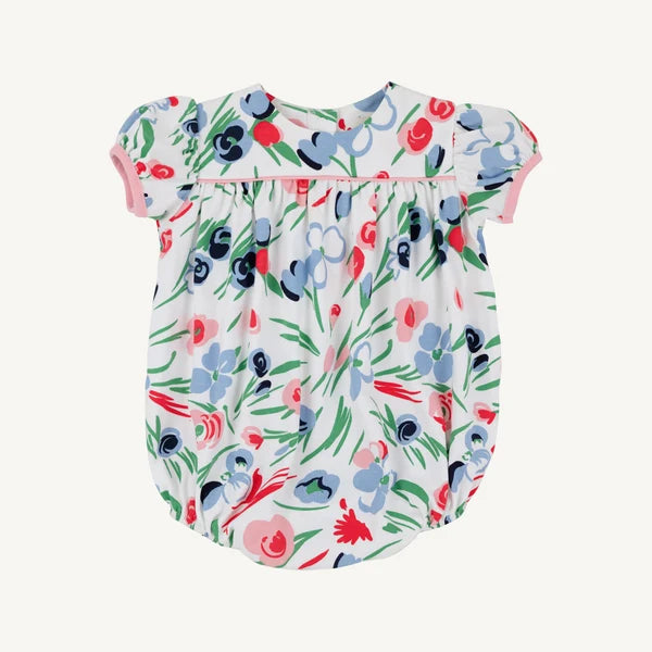 A baby short-sleeve bodysuit with a colorful floral print on a white background, featuring pink trim on the sleeves and neckline.