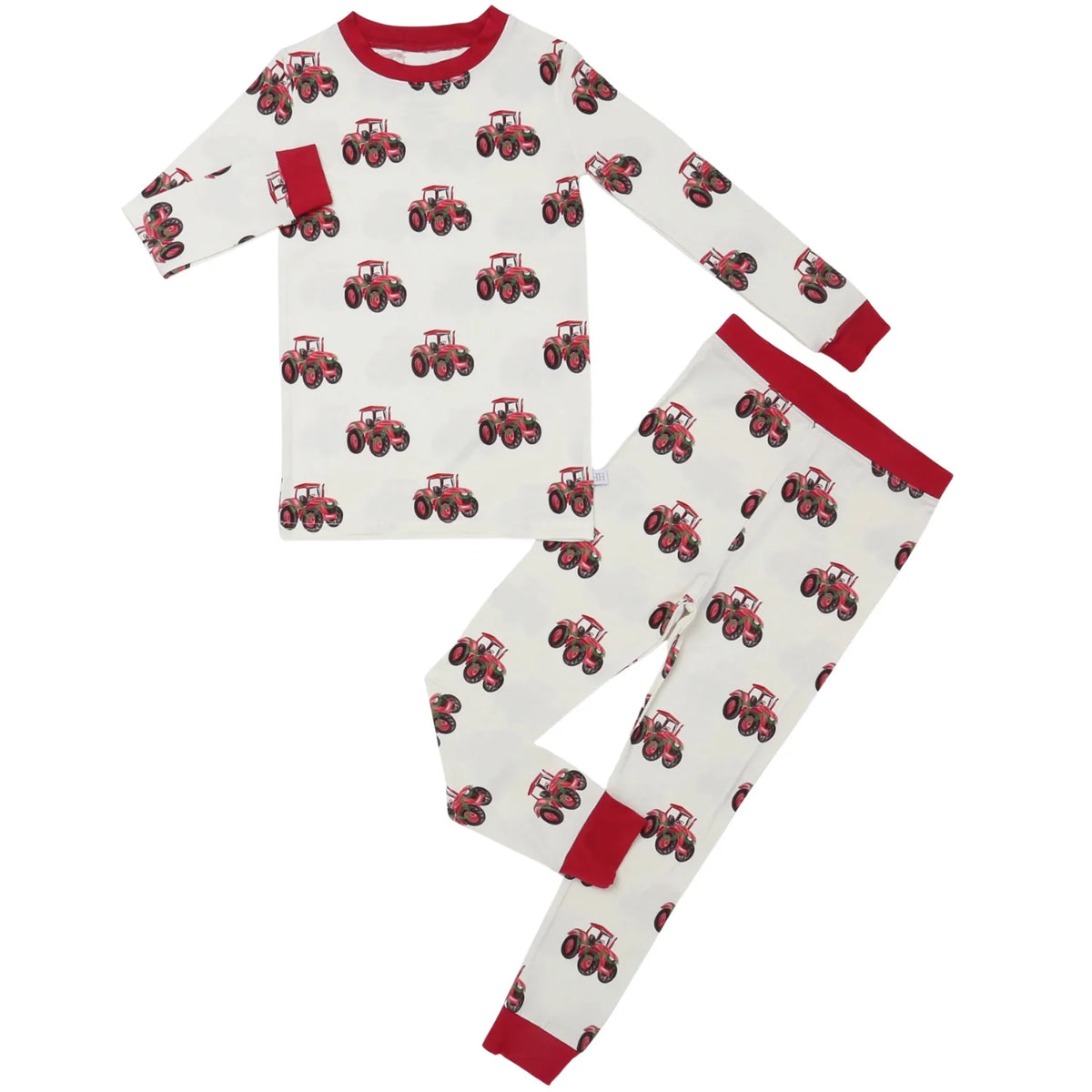A two-piece children's pajama set featuring a long-sleeve top and matching pants. The pajamas are off-white with an all-over print of red tractors, accented with solid red trim on the collar, cuffs, pocket, and leg openings.