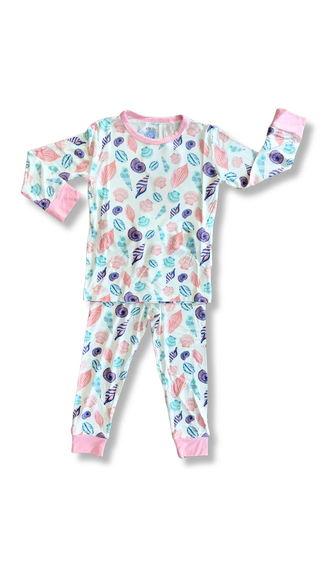 Children's pajama set with a colorful shell pattern on a white background