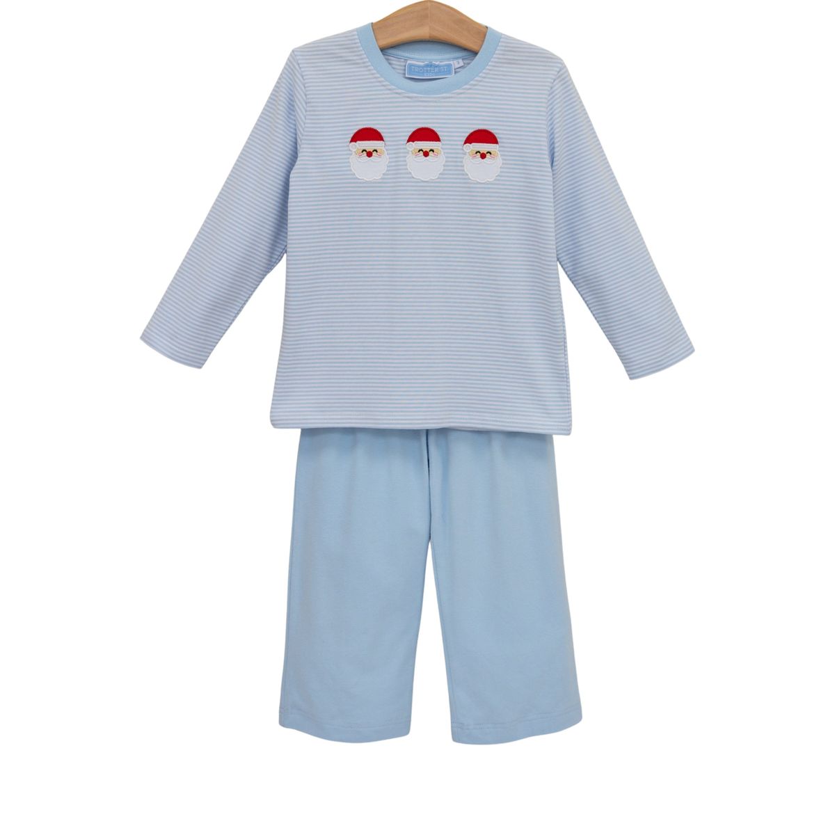 Children's light blue pajama set with Santa Claus design on a white background