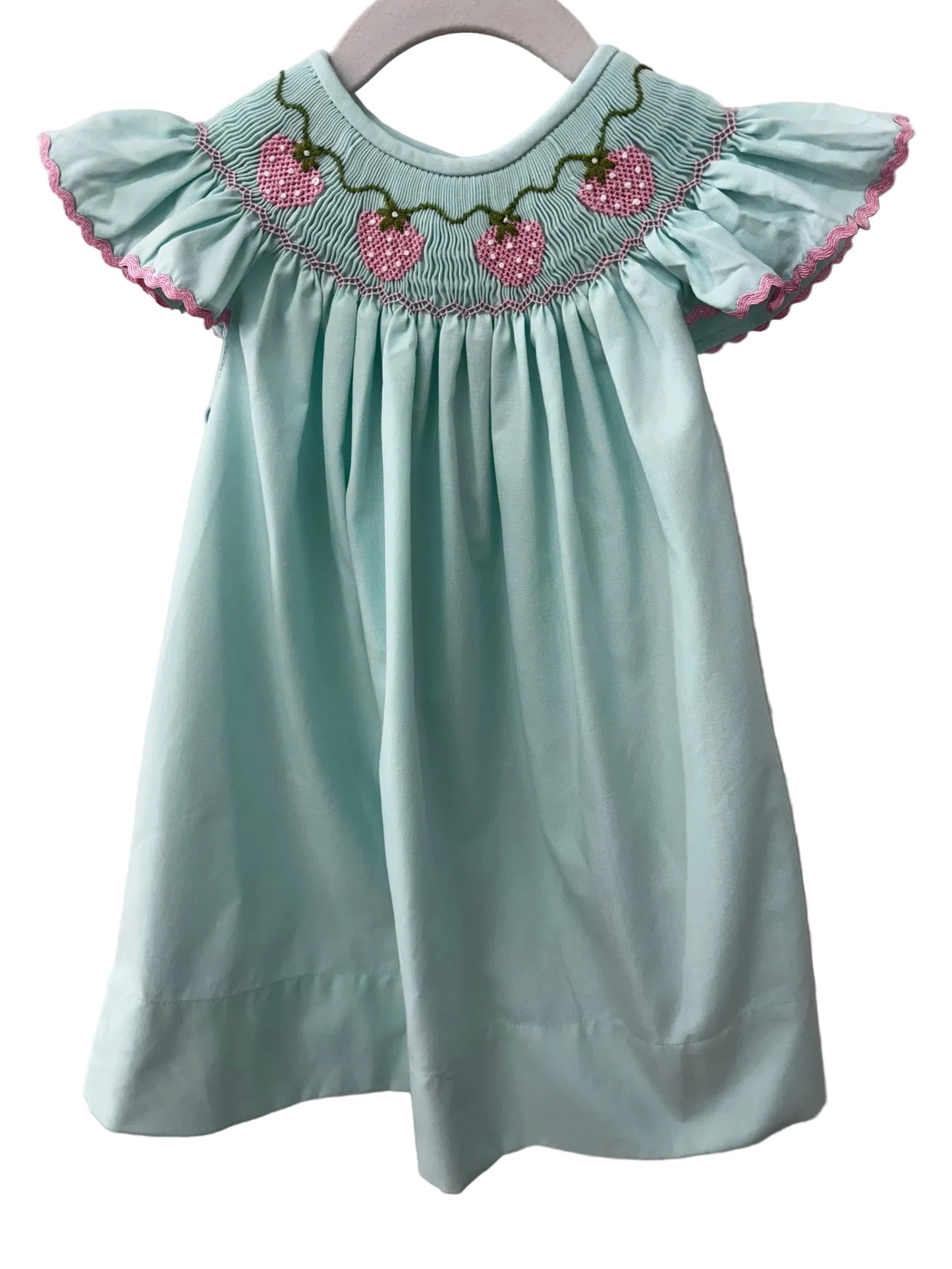 Mint green dress with pink strawberry embroidery on a smocked bodice and pink rick rack trim on the ruffle sleeves.