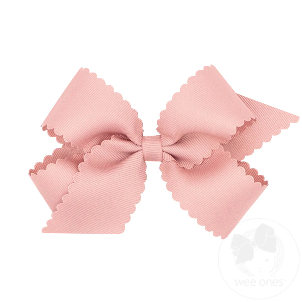 Medium matte pink bow with scallop edges