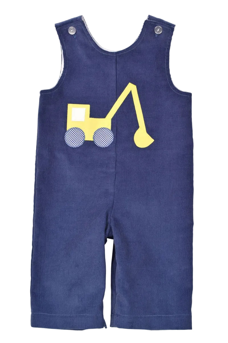 A baby's blue corduroy overall romper featuring a yellow excavator applique on the chest, displayed flat against a light off-white background.