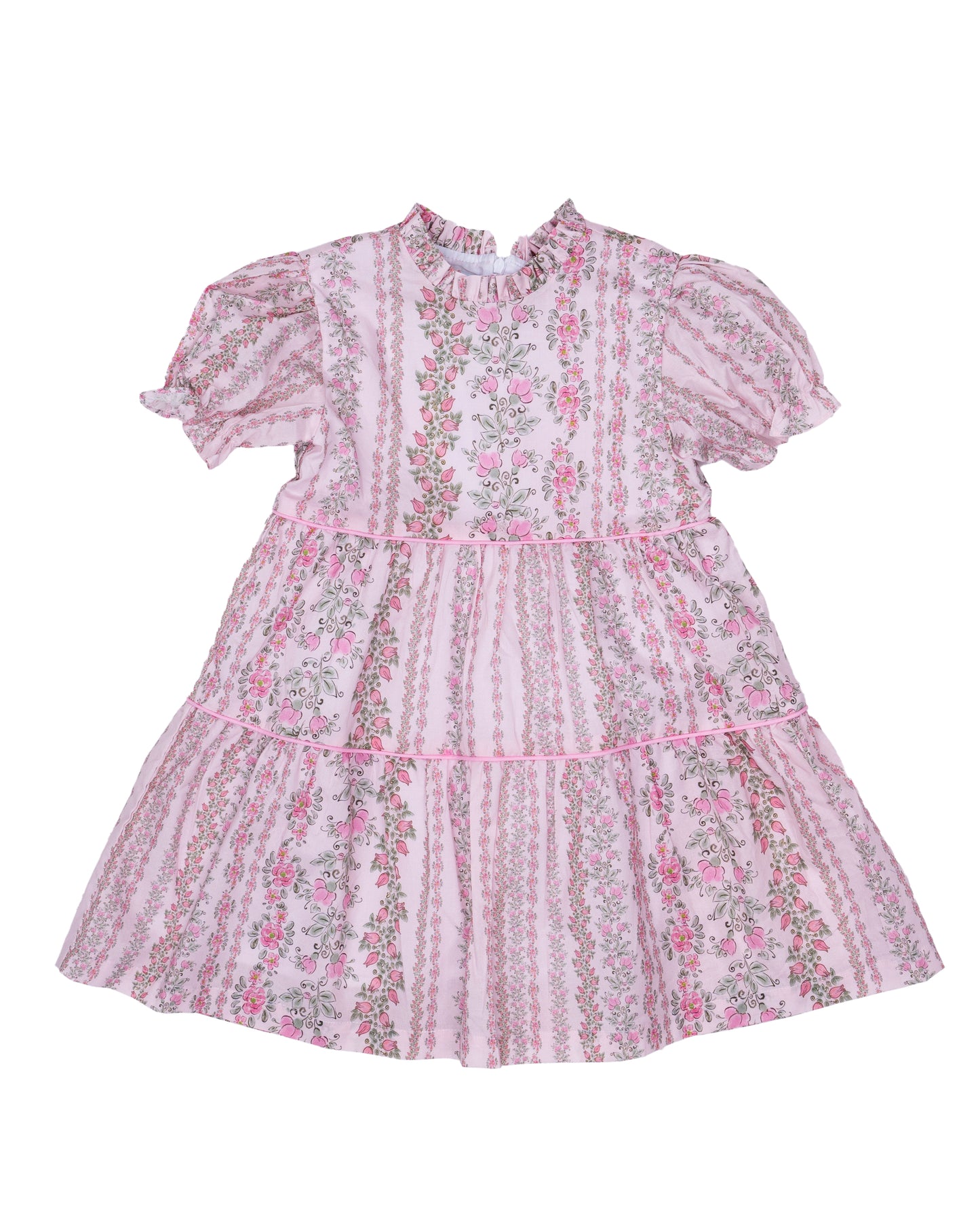 Pink and green floral dress with ruffles on collar and body of dress.