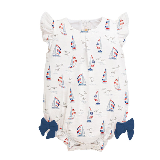 Baby romper with sailboat pattern on a white background