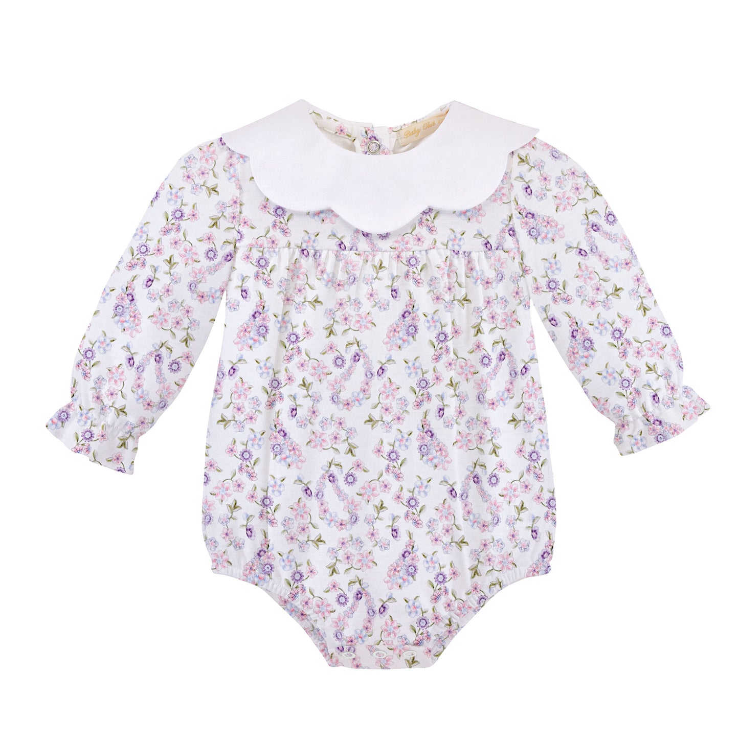 A baby long-sleeve romper with a white floral and paisley print, featuring a white scalloped Peter Pan collar and ruffled cuffs, shown on a plain white background.