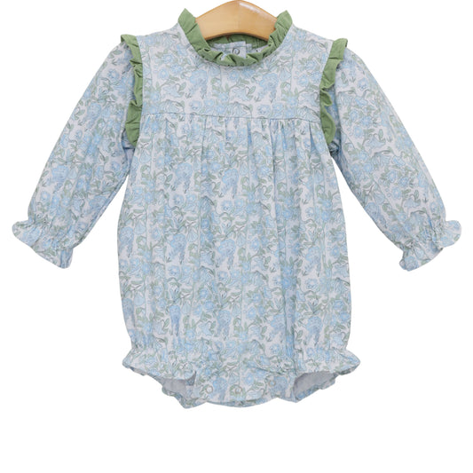Baby romper with floral pattern and green trim 