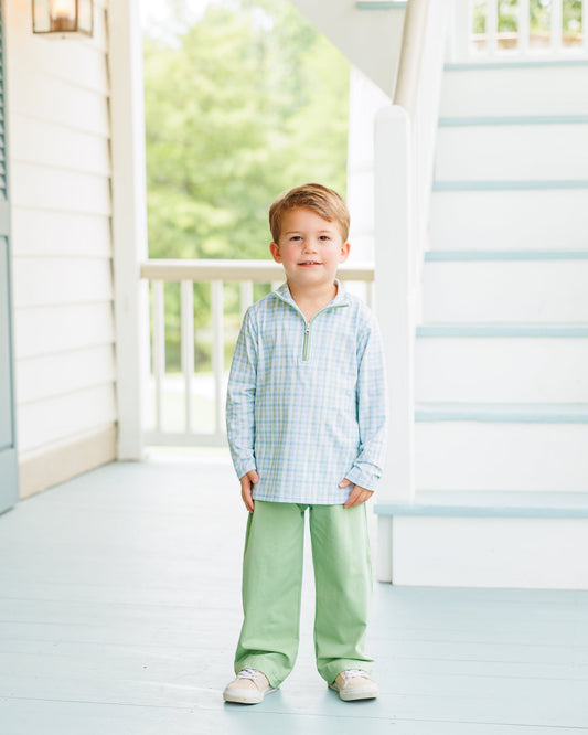 green and blue pullover with matching green pants 