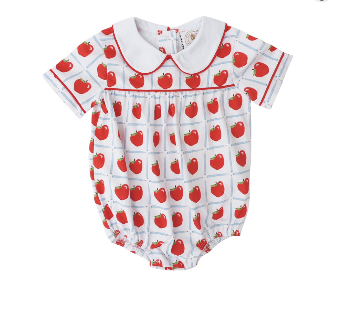 White bubble with red apples inside a blue pencil check pattern, with red piping around the collar and short sleeves.