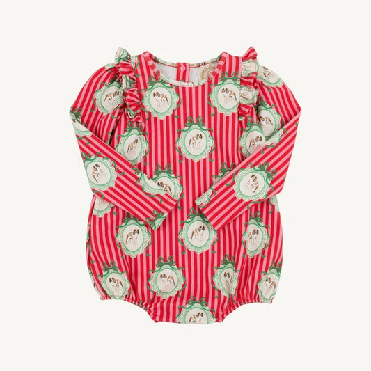 A long-sleeve baby romper with a red and white vertical stripe pattern, decorated with green-bordered oval medallions containing small dog illustrations. The romper features ruffled trim at the neckline and cuffs, and is displayed flat against a light off-white background.