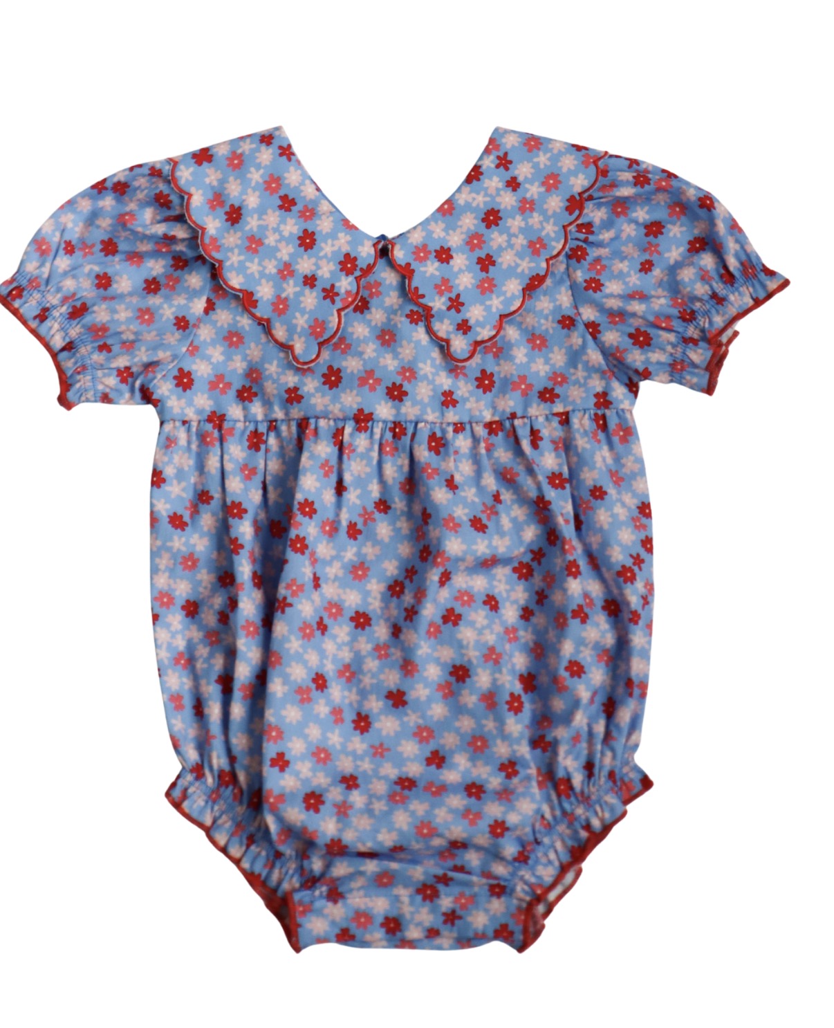 Baby romper with red white and blue floral pattern with a wide collar 
