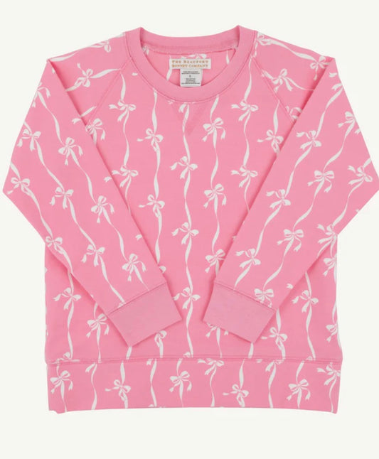 Pink sweatshirt with white bow pattern on a white background