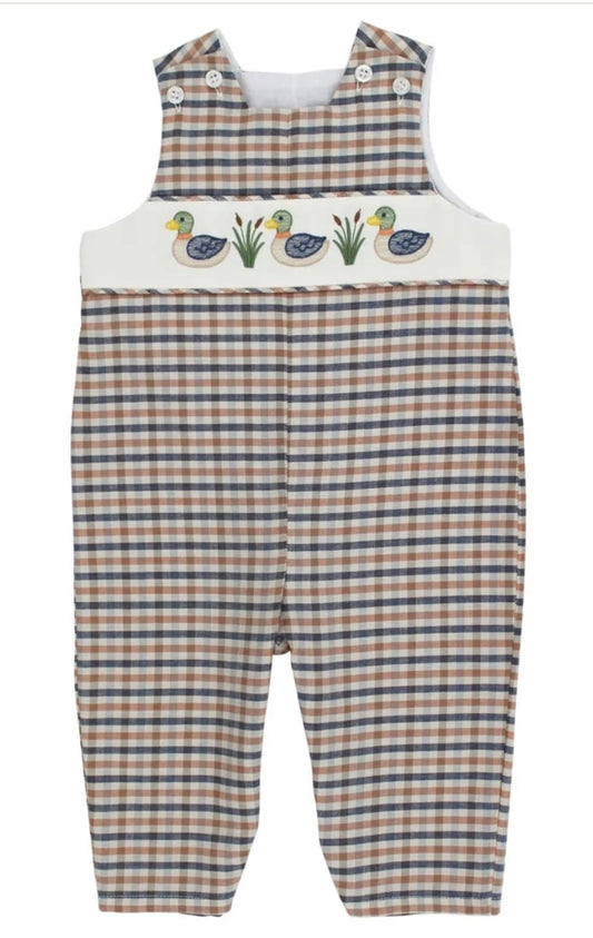 Checkered overalls with duck design on a white background