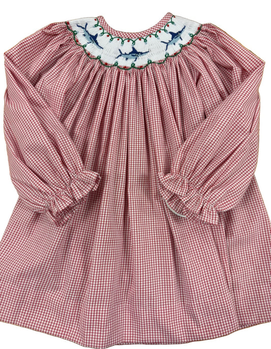 A long-sleeve baby smocked dress in a red and white gingham pattern, featuring a white smocked marlin design with embroidered blue and green marlin motifs.