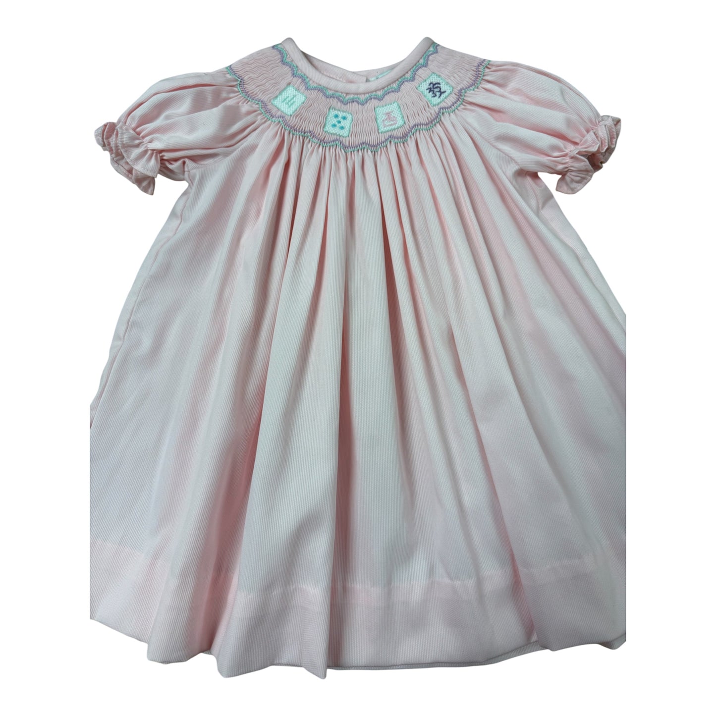 Light pink smocked dress with mahjong tiles design 