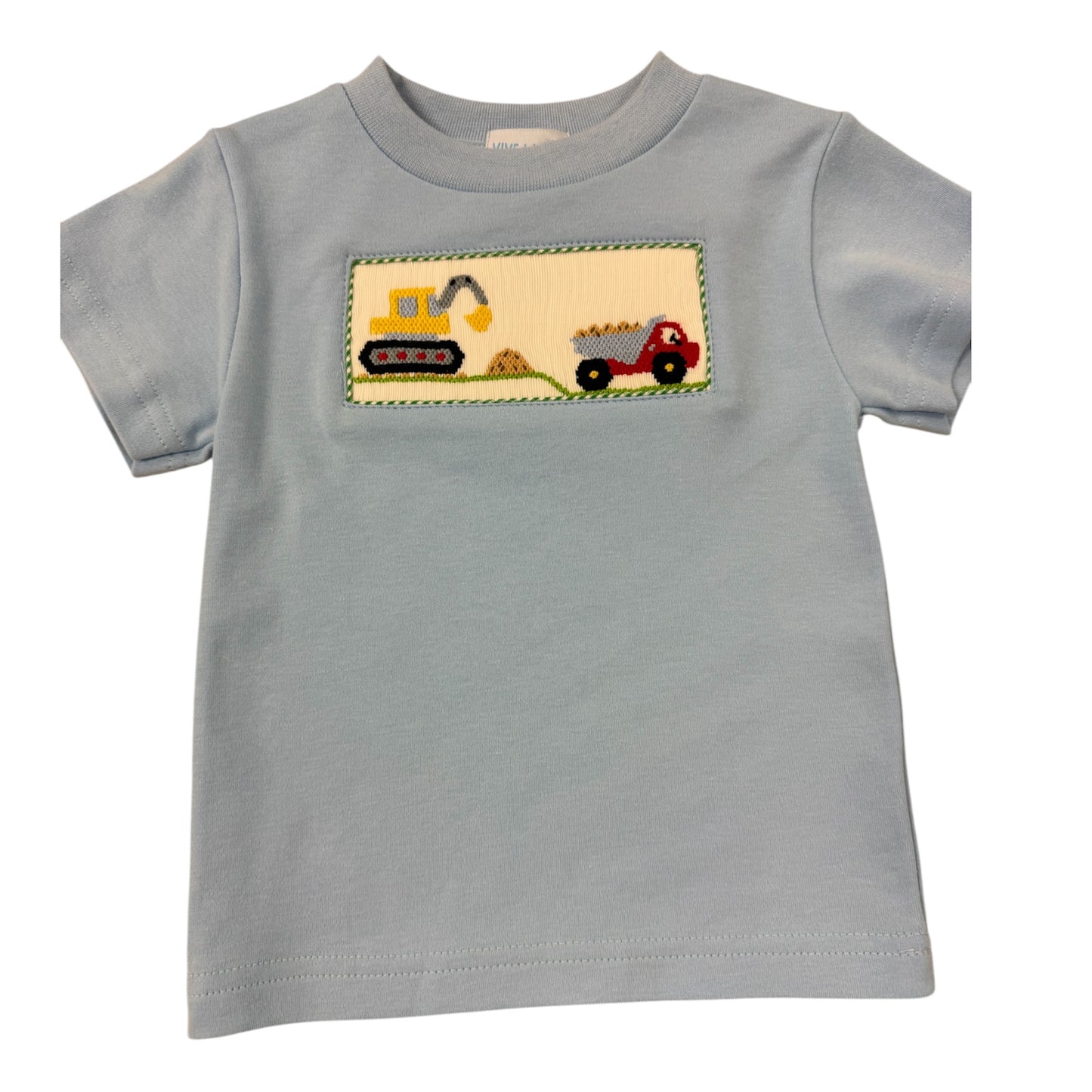 Blue Smocked shirt with a construction-themed patch on a white background