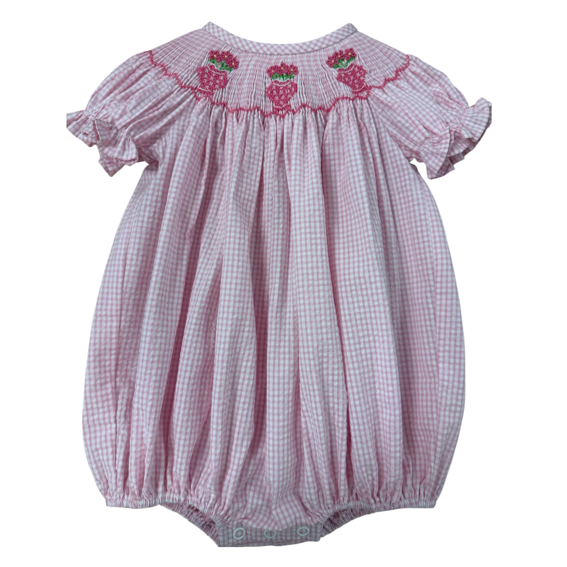 Pink checkered smocled baby romper with pink ginger jars embroidered details.