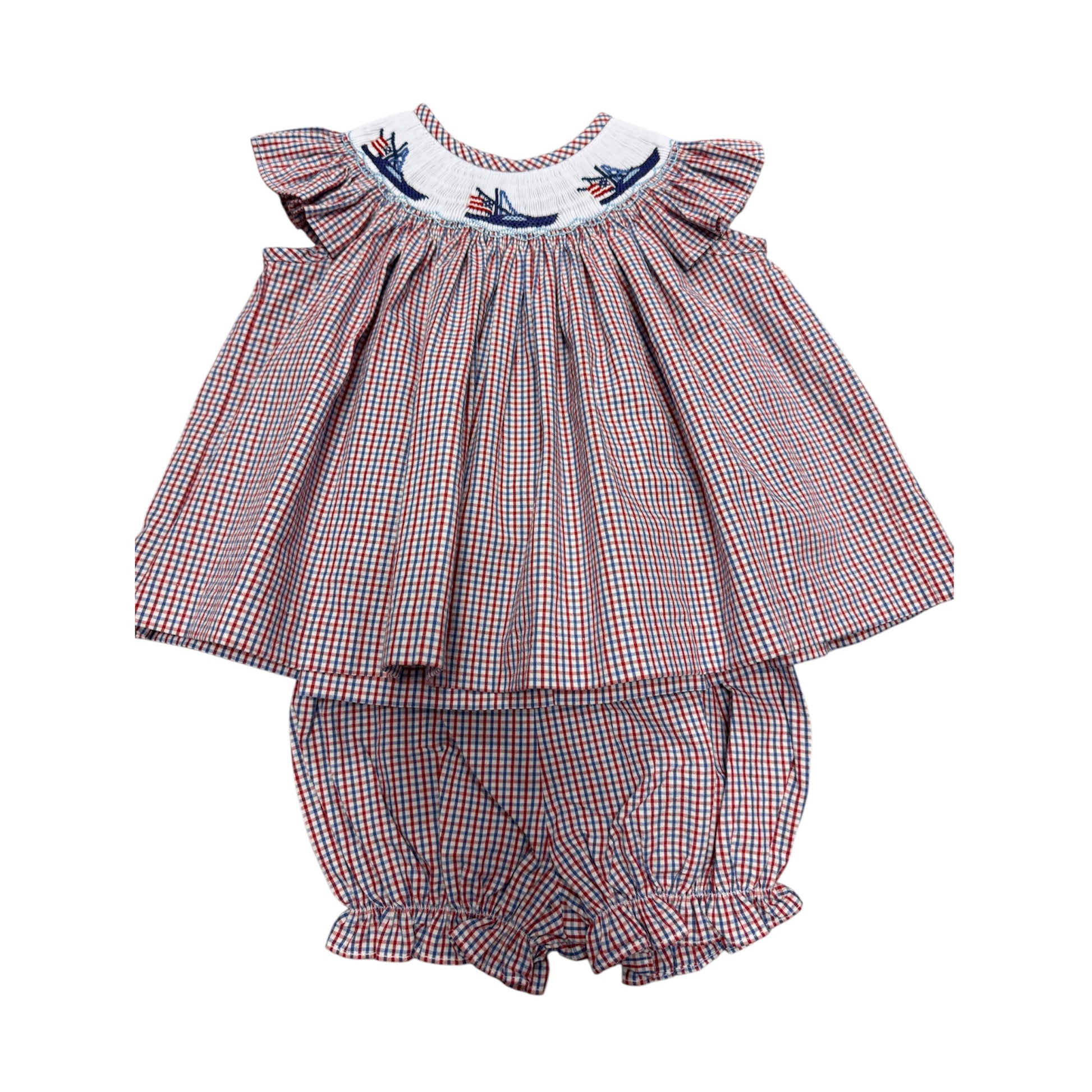 Red, white, and blue checkered smocked baby outfit with ruffled top and bloomers with three boats across the collar.