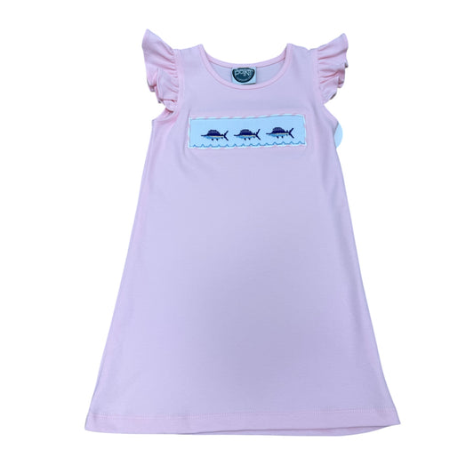 Pink smocked dress with fish designs across chest with ruffle sleeves.