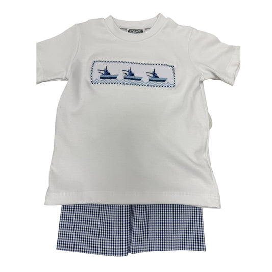 White smocked t-shirt with three boats across the chest and blue checkered shorts