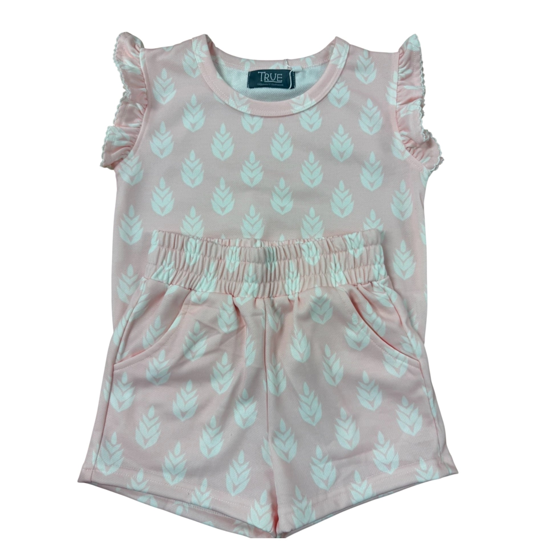 Pink two piece short set with a white leaf pattern 
