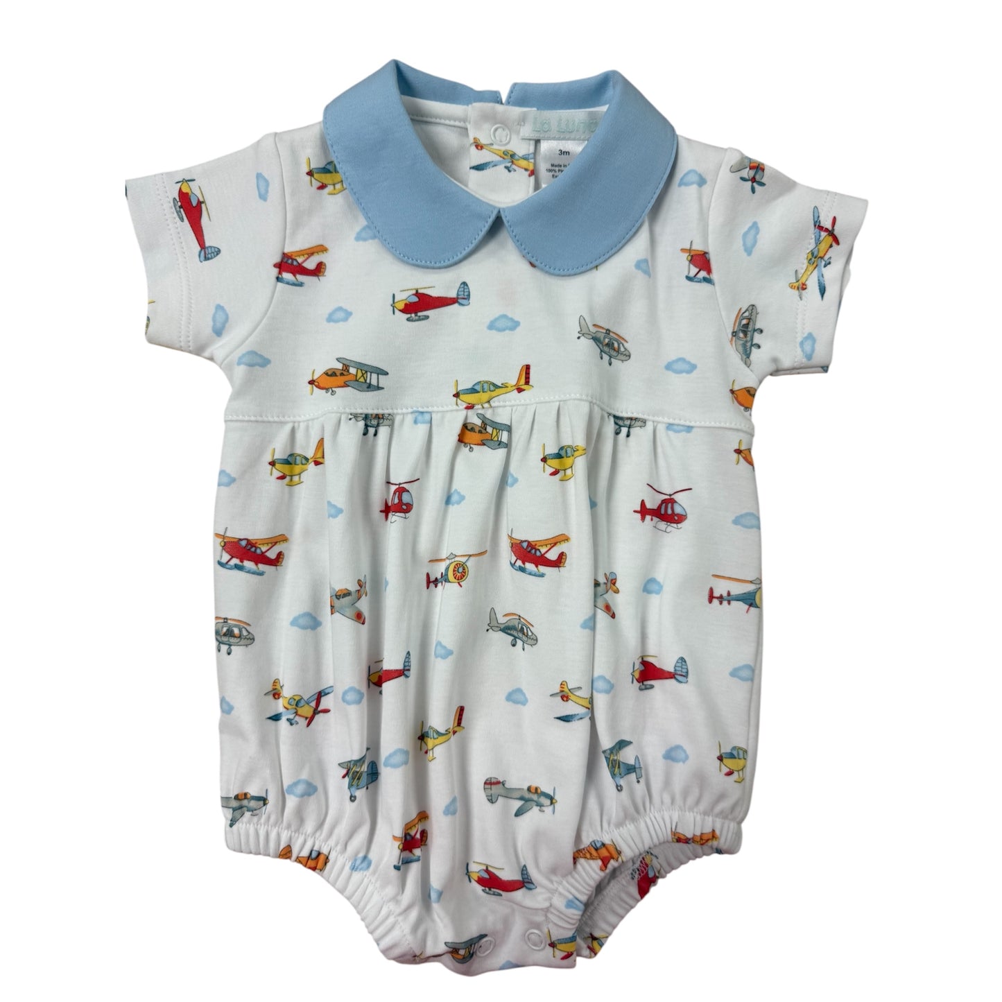 Baby romper with airplane pattern and blue collar on a white background