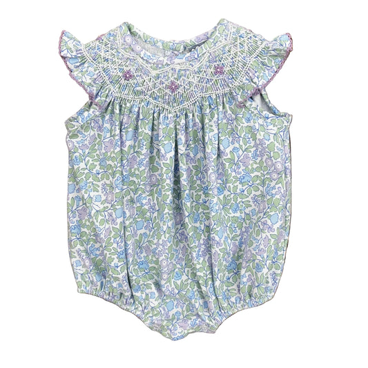 Lilac floral print bubble with a smocked neckline and ruffle sleeves.