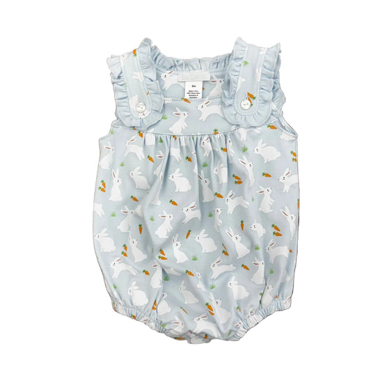 Baby girl bubble with ruffle straps and a bunny and carrot design on a pale blue background.