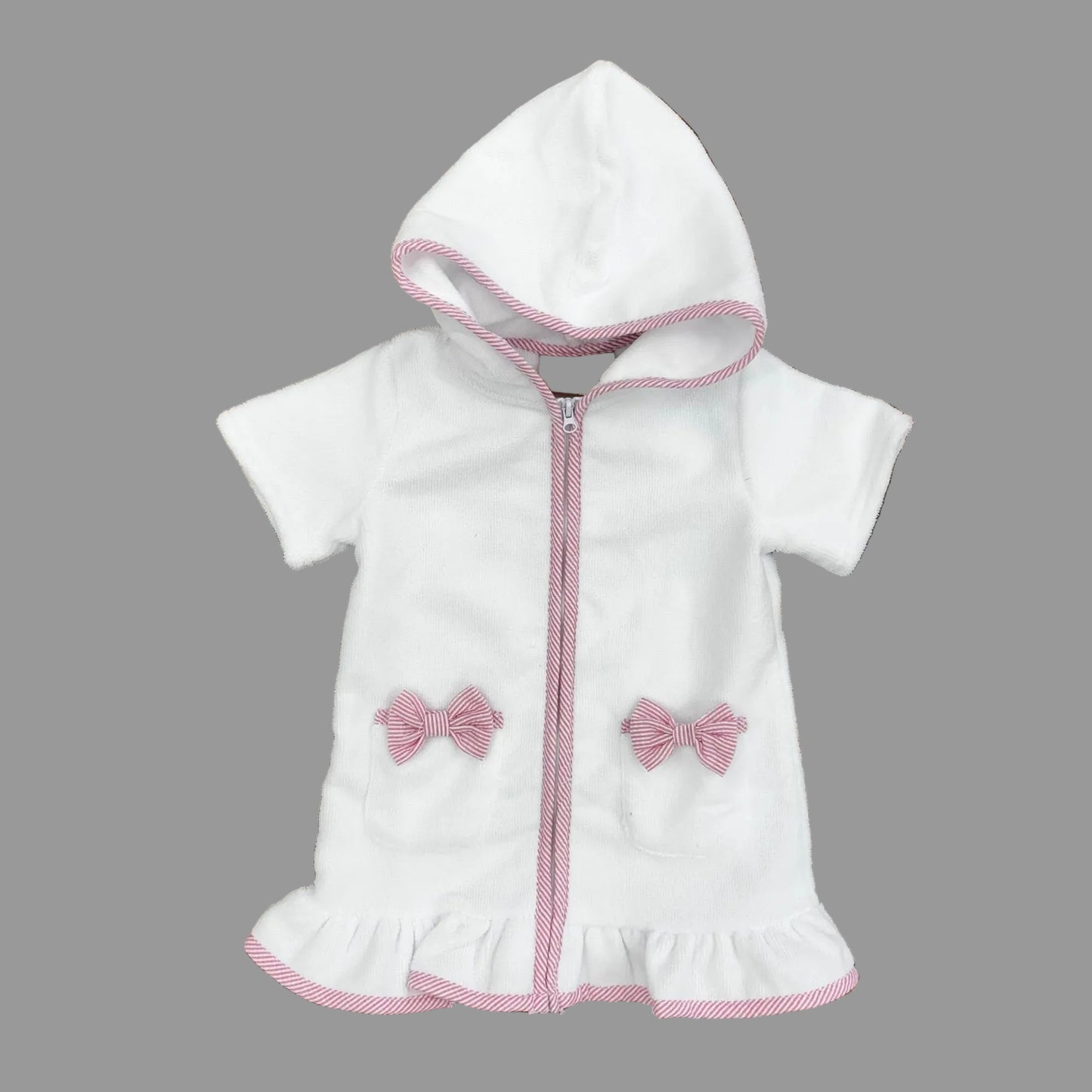 White terry cloth beach coverup with pink stripe trim.