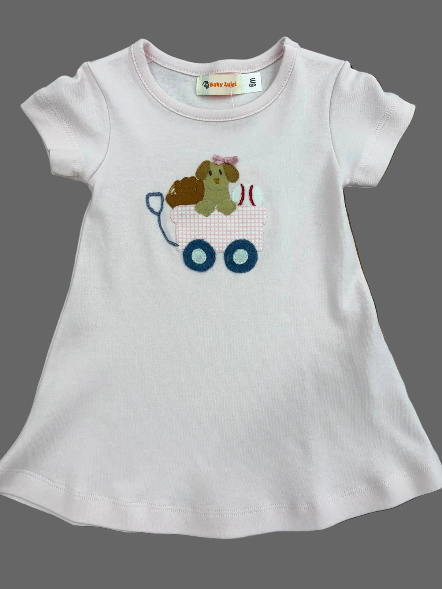 Pale pink t-shirt dress with puppy applique.