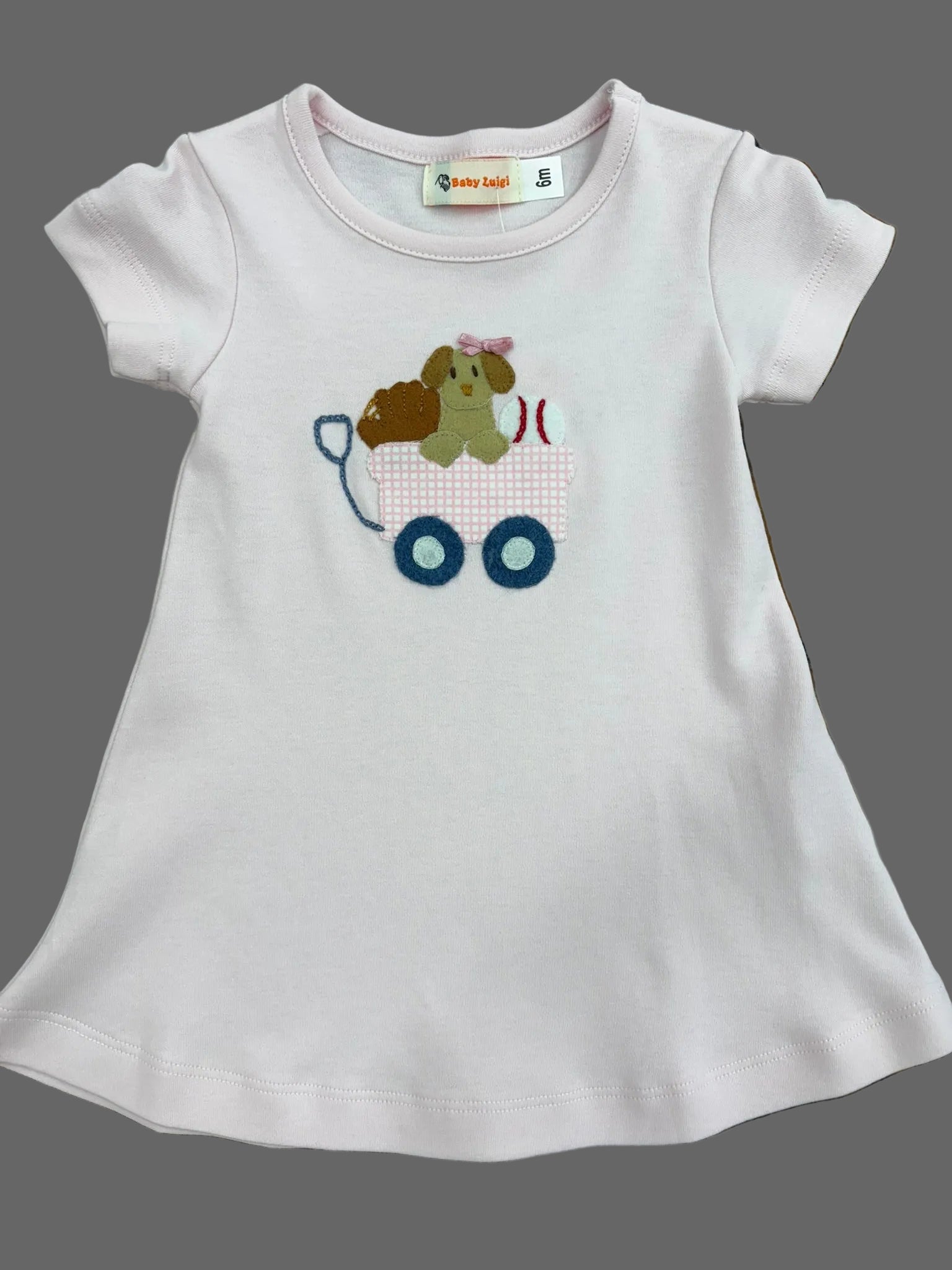 Pale pink t-shirt dress with puppy applique.