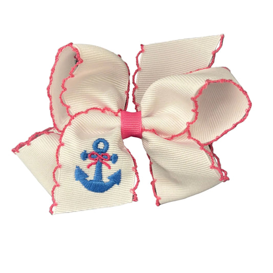White grosgrain bow with a bright pink moonstitch edge and a blue embroidered anchor.