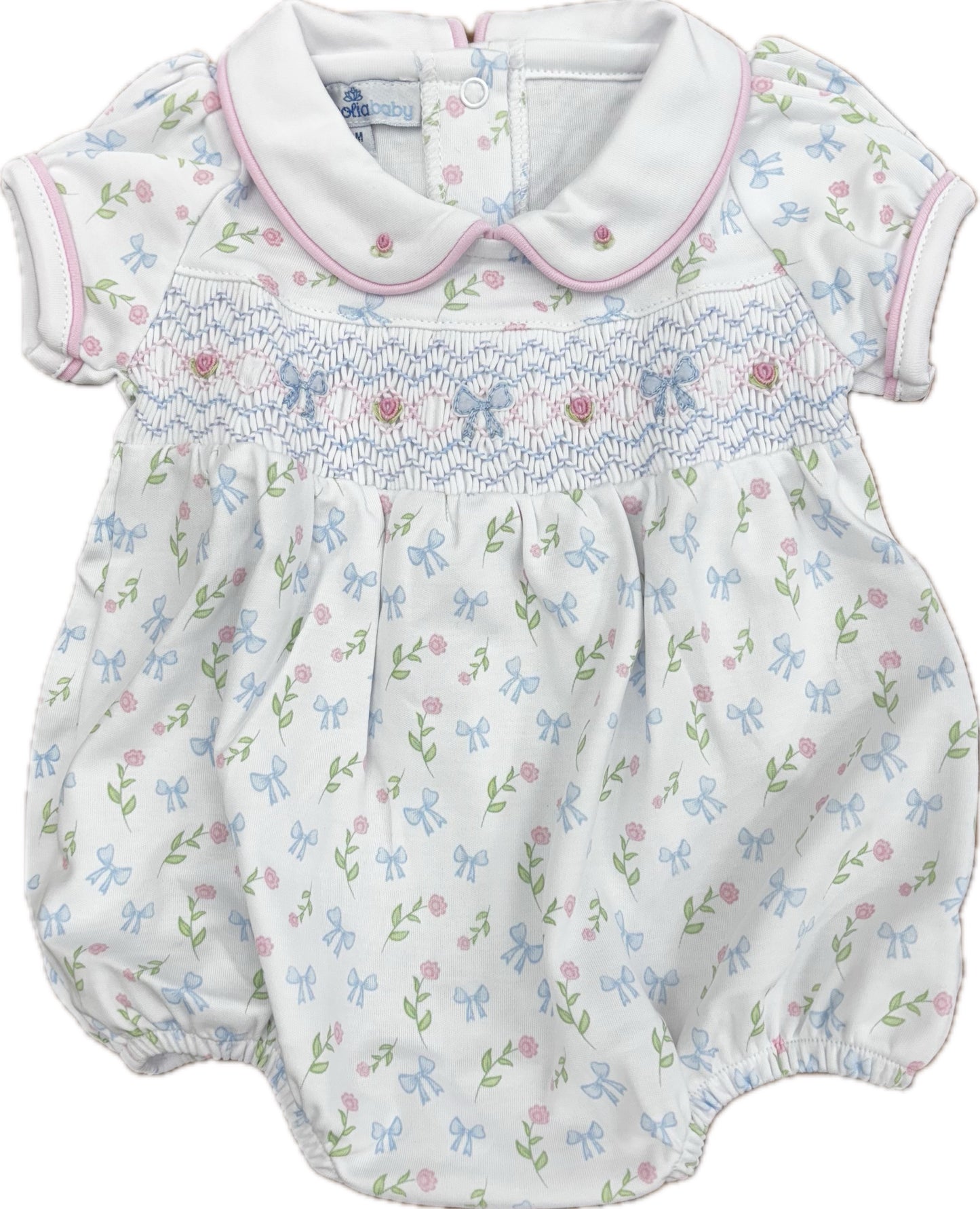 White girl's bubble with blue smocking, pink trim on the collar and short sleeves and an allover flower pattern.