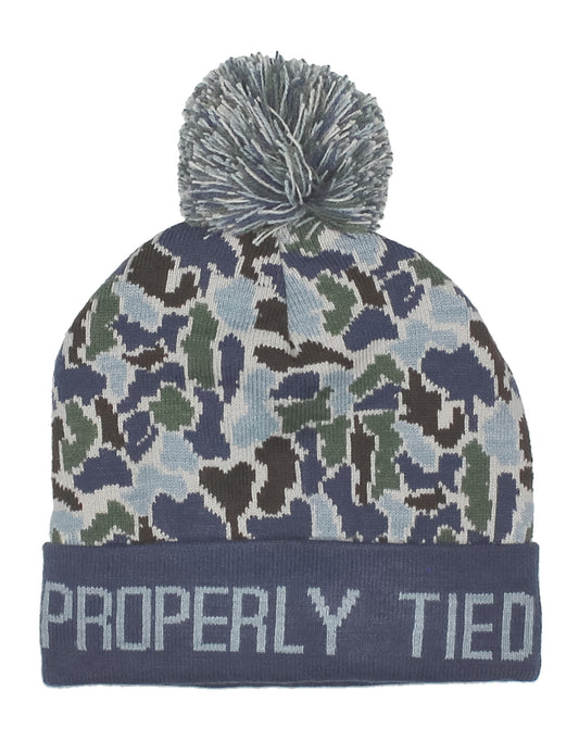 Camouflage patterned beanie with pom-pom and 'Properly Tied' text on a white background