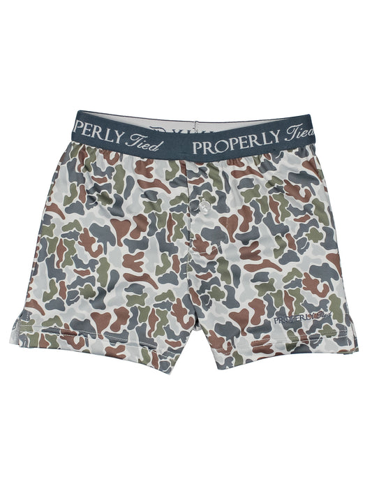 Camouflage-patterned underwear with 'Properly Tied' branding on a white background