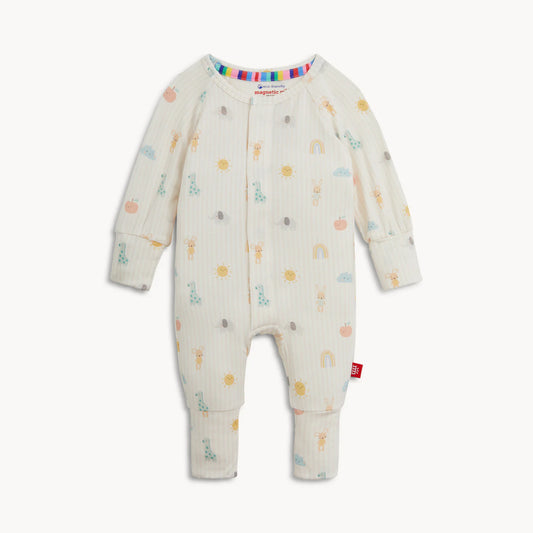 Pale pink striped coverall with a nursery pattern.