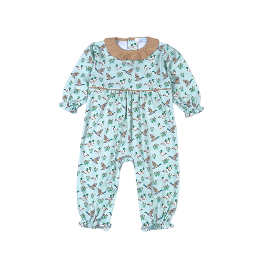 A baby long-sleeve footless romper in mint green with a brown and white dog print, featuring a tan ruffled collar 